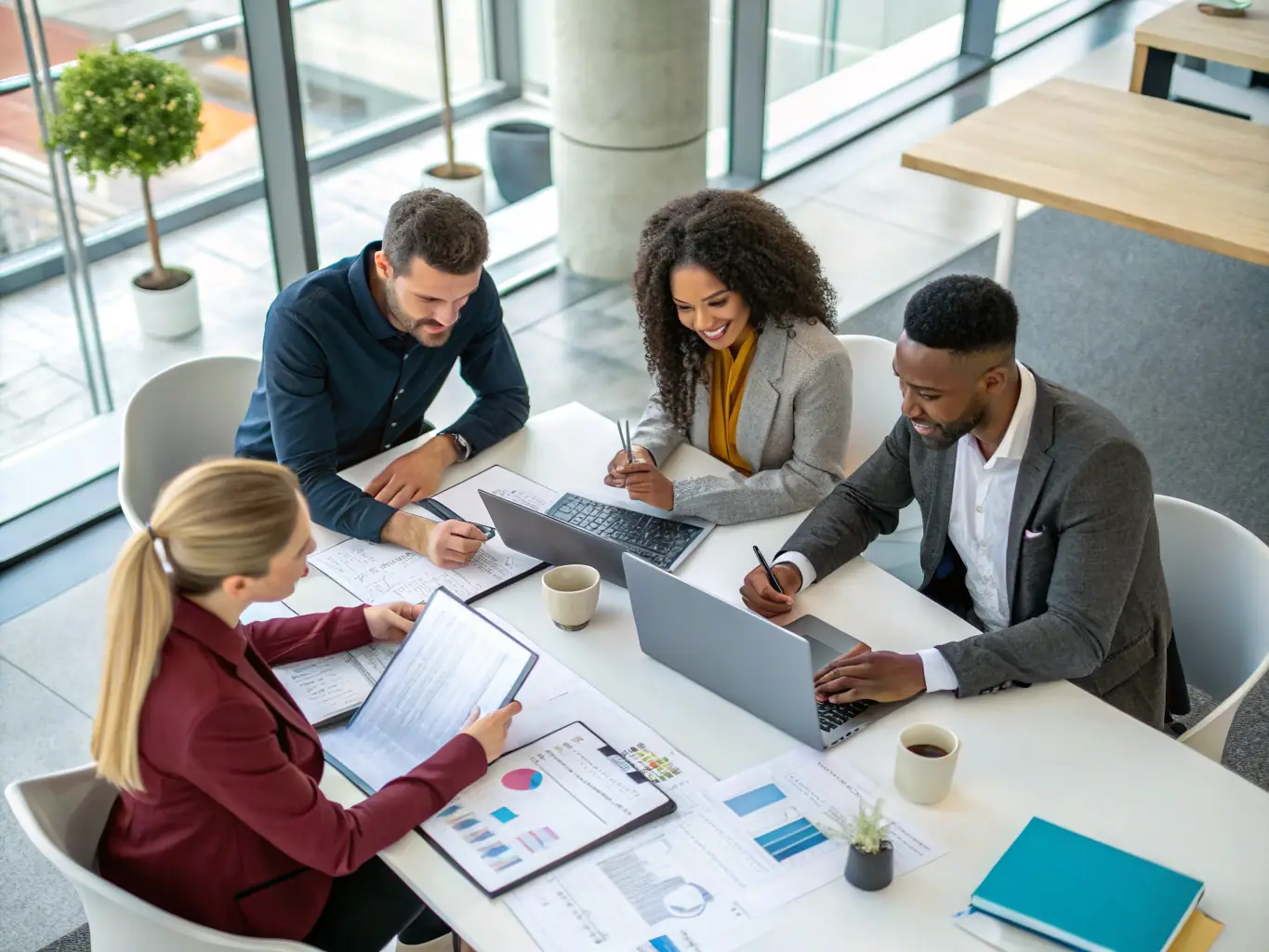 A diverse team collaborating on a project, showcasing Leaderuno's commitment to innovation and teamwork.